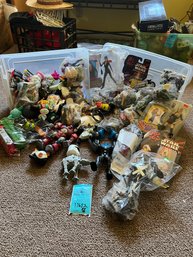 Action Figures, Small Toys  - Two Bins Full. Quantity And Specific Type Unknown (surprise!)