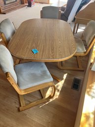 Table And Four Chairs. Includes One Leaf
