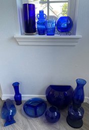 Collection Of Blue Glass  Including An Oil Lamp, Ashtray, Vases, And A Small Pitcher
