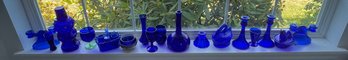 Variety Of Blue Glass 2 Including Candlestick Holders, A Basket, Vases, Glasses And Other Pieces