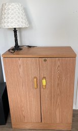 Small Cupboard With Lock And Key And A Lamp