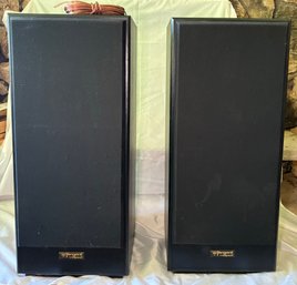 R7 Tangent By Klipsch Two Stereo Speaker With A Bundle Of Wire, Located Up Stairs