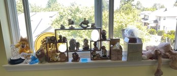 Collection Of Lions Including Stuffed, Figurines, And Snowglobes