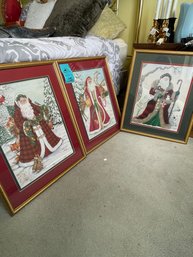 Three Framed Santa Claus Themed Prints
