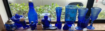 R3 Blue Glass Measuring Cup With Juicer, Flip-top Milk Bottle, And Decorative Items