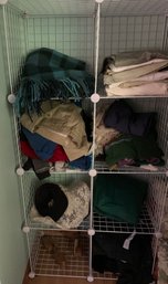 R12 Interlocking Closet Wire Shelving Cubes, Blanket, Assorted Hats, Assorted Mens Clothing (size L)