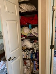 Linen Closet Contents: Towels, Bathmats, Curtain, Assorted Toiletries, Quilt, Humidifier, Plunger