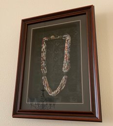 Multi Strand Necklace In Glass Frame