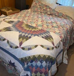 R9 Bed Frame, Mattress, Pillows, And All Linens Such As Quilted Patterns Included On Bed