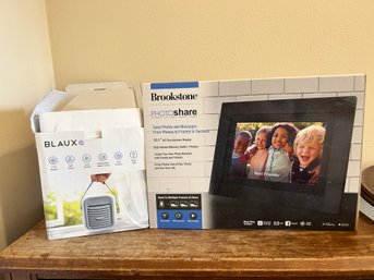 R9 BLAUX Portable AC, Brand New Brookstone Photoshare