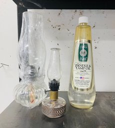 RM0 One Large And One Small Oil Lamp And Lamp Oil