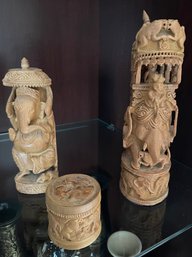 Three Wood Carved Statues