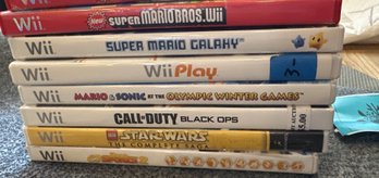 Wii Games Including Super Mario Brothers, Lego Star Wars, Call Of Duty, Mario And Sonic Olympic Winter Games