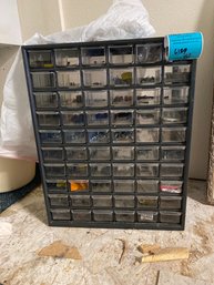 Storage Cabinet With Various Screws And Other Pieces