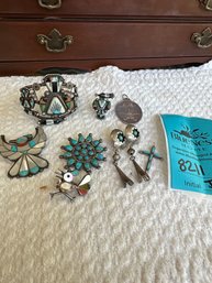 Silver Brooches, Earrings, And Bracelets