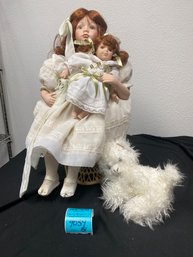 Ceramic Doll With Small Doll And Stuff Cat