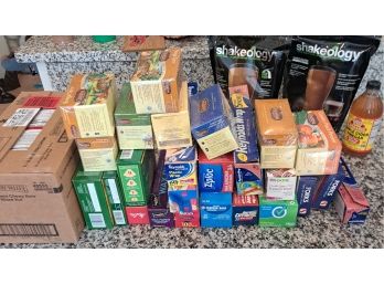 R8 Assortment Of Teas, Coffee Filters, Aluminum Foil, Plastic Ware, Saran Wrap, Plastic Bags, Shakeology