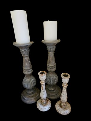 Two Pairs Of Candlesticks With Two Candles
