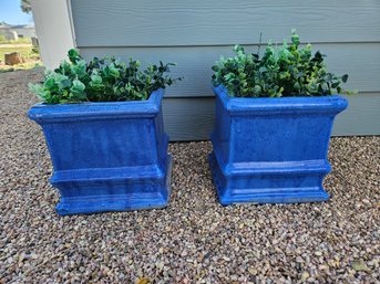 A Pair Of Blue Square Shaped Planters