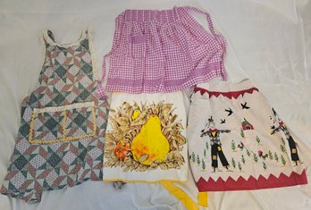 Four Vintage Aprons