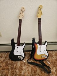 A Pair Of Rockband Harmonix Guitars