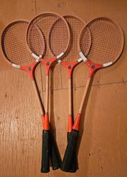 Four Badminton Rackets