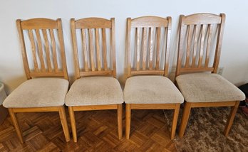 Four Oak Chairs With Beige Cushions