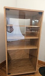 Wheeled Oak Cabinet With Magnetic Glass Door