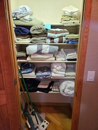 Closet Full Of Linens Plus Some Cleaning Supplies