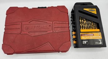 A Pair Of Craftsman And Warrior Drill Bit Sets