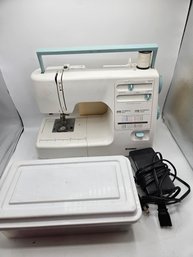 Two Sewing Machines With Supplies