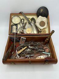 Assortment Of Man Thingy Majigs And Whatchamacallits In Small Wood Chest