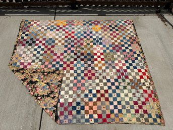 Postage Stamp Quilt With Fantastic Fabric On The Backside