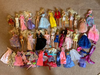 Large Assortment Of Vintage Mattel Barbies And Friends And Barbie Clothes