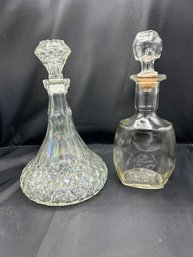 Two Glass Decanters With Stoppers