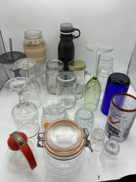 Assortment Of Mismatched Glassware And Cups