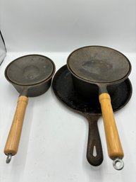 Cast Iron Pots And Round Griddle