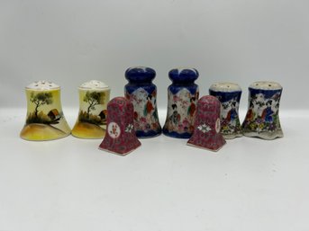 Salt And Pepper Shakers With Asian Designs
