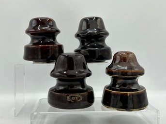 Group Of 4 Dark Brown Ceramic / Porcelain Insulators