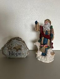 Santa Claus Figurine And Decorative Faux Stone
