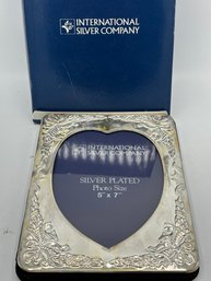 Silver Heart Shaped Picture Frame.