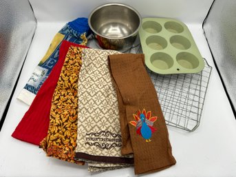 Kitchen Towels, Cooling Racks, Muffin Pan, And Small Metal Mixing Bowl