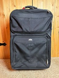 Samsonite Checked Bag Rolling Luggage