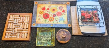 Various Types Of Cutting Boards, Trivets, And A Tostonera.