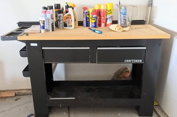 Craftsman Work Bench With Miscellaneous Items.