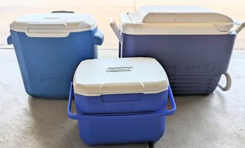 An Assortment Of Three Different Size Coolers