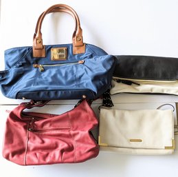 A Bundle Of Women's Bags Featuring A Calvin Klein Bag.