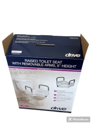 New In Box Raised Toilet Seat