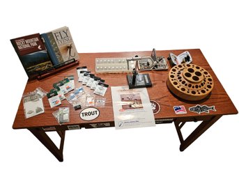 Table With Fly Fishing Supplies Including Dynaking Barracuda Junior Vise