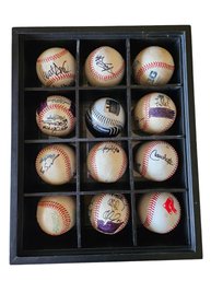 Shadow Box With Signed Baseballs Including One Signed By Carlos Beltran